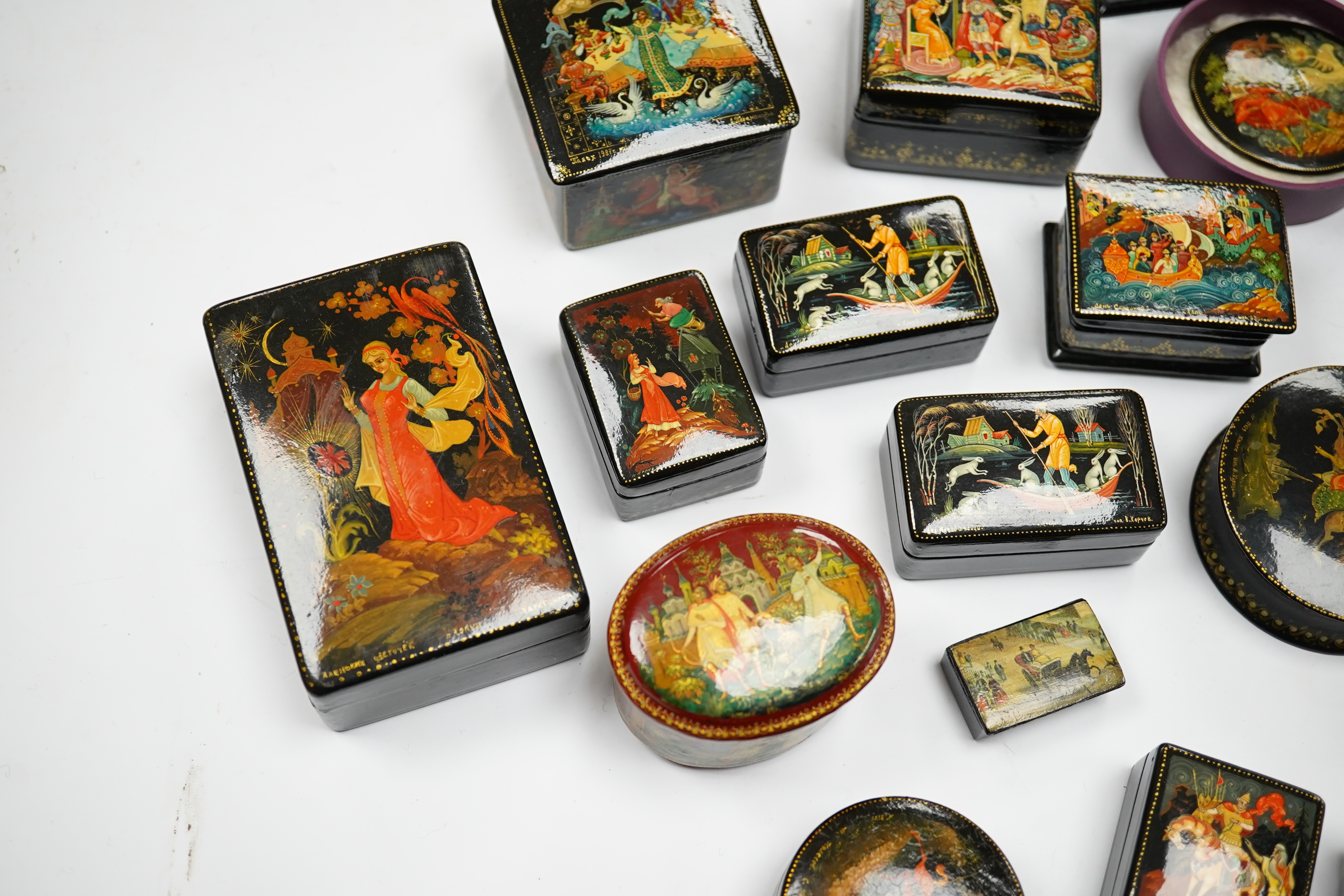 A quantity of late 19th / early 20th century Russian lacquer boxes, largest 9cm. Condition - mostly good